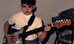 Jimmy Hotz playing Guitar when very young